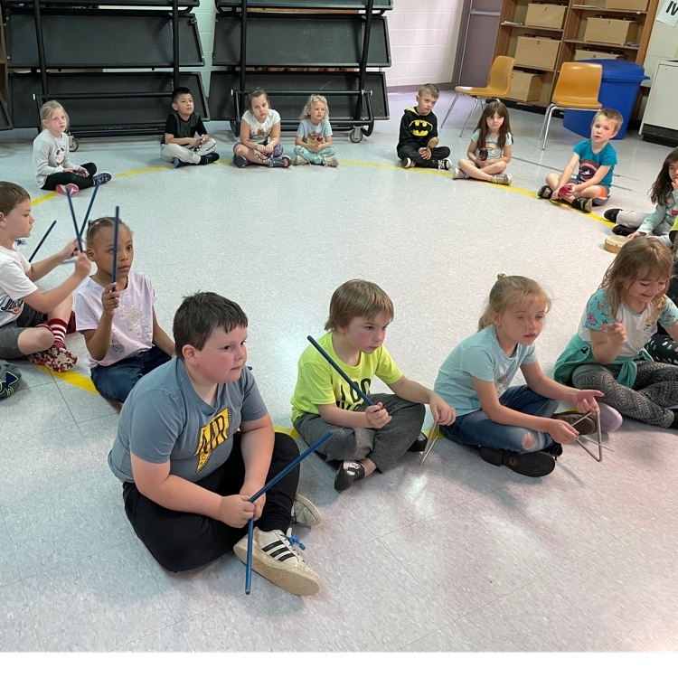 Mrs Barrett’s kindergartners learn when to play their instruments !